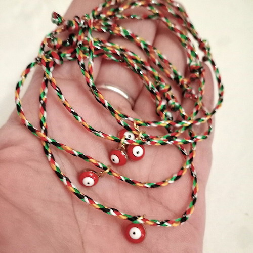 Gourakia bracelets set of 5 with red eye new