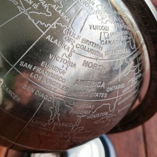 Decorative metal globe with wooden base like new