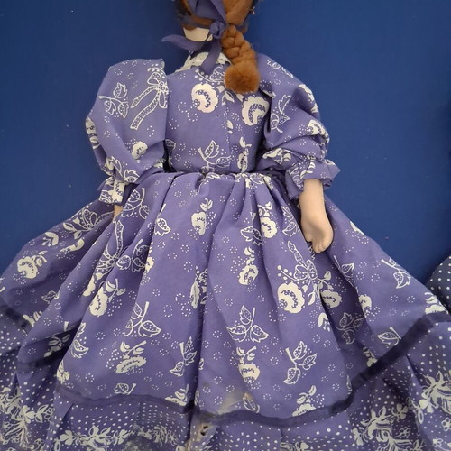Vintage Slavic doll with porcelain head and fabric body