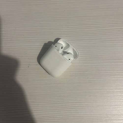 Apple AirPods 2nd Generation used, model A1602 with wired charging case