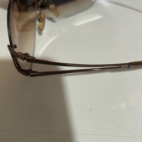 Givenchy women's sunglasses like new, brown metal frame