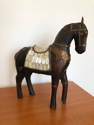 Wooden decorative horse used with mother-of-pearl saddle