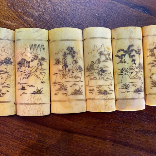 Vintage Asian folding bone carving with erotic scenes in natural ox bone