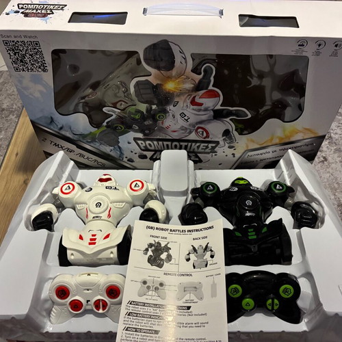 Robot robotic battles 2 robots like new with remote controls, light and sounds