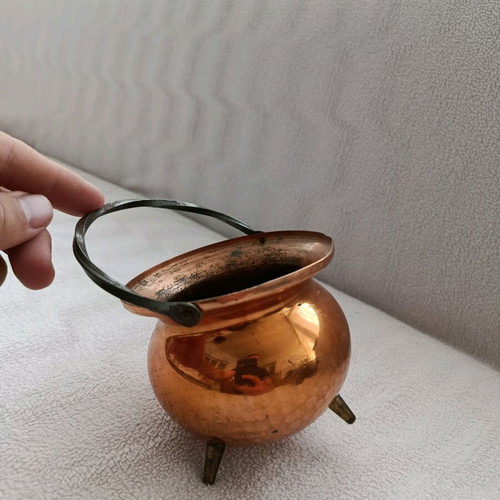 Vintage German copper vessel used with twisted handle and brass legs