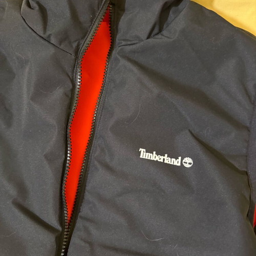 Timberland sleeveless reversible jacket new, orange and black