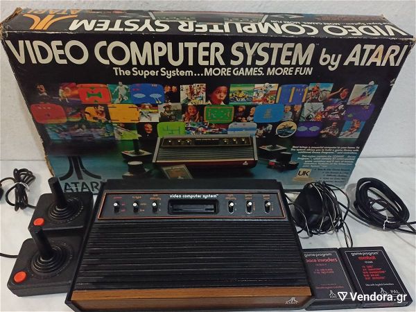  Atari 2600 "Woody" sto kouti tou, komple, aristi katastasi, gia sillekti