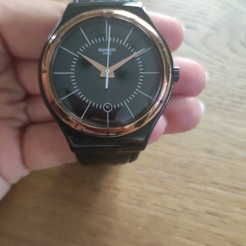 Swatch Black Nachtigall wristwatch YWB403, black dial with rose gold accents