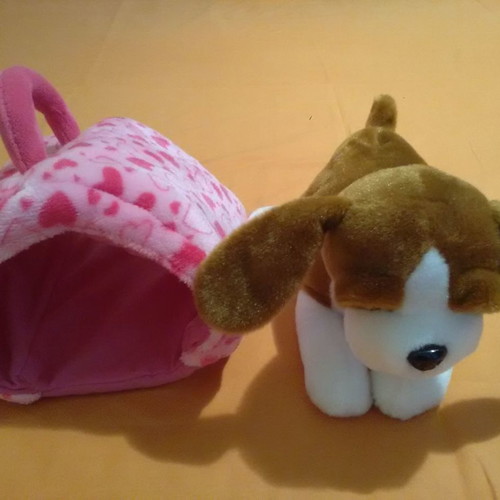 Stuffed dogs used with suitcases