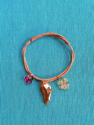 Adjustable bracelet used with brown and multicolor crystals