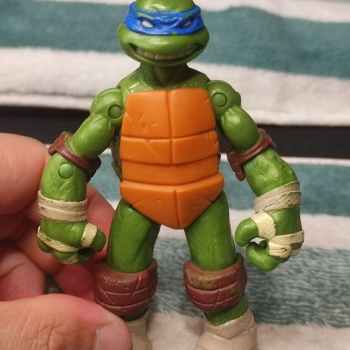 Leonardo Teenage Mutant Ninja Turtle figure used, missing shell