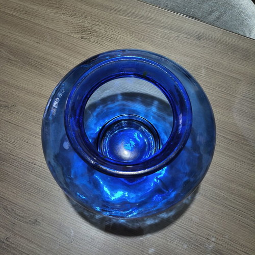 Blue glass vase, deep color and wide round shape