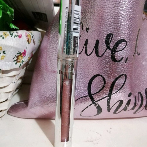Dermacol lip gloss used, soft pink with shine