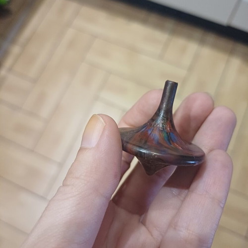 Spinning top made of recycled plastic caps, new