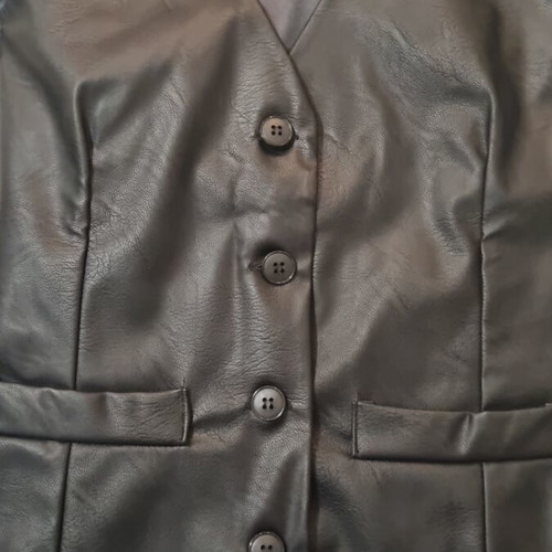 Women's leather vest new, size small Marlen