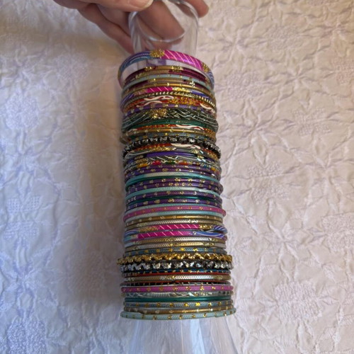 Indian glass bracelets like new, set of 54, colorful and decorated