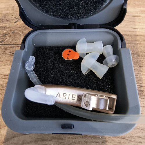 Aries Hearing Aid brand new with original case and accessories