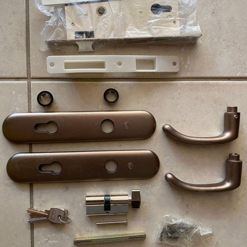 Set of interior door handles and locks, new, coffee brown and champagne