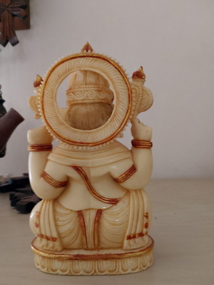 Marble Ganesha with gold details for prosperity