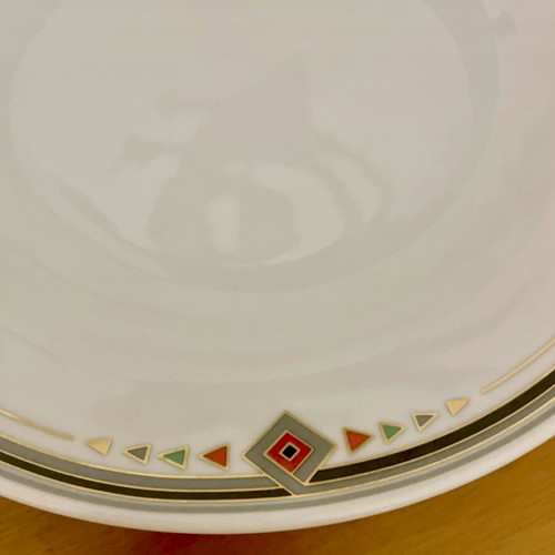 Vintage Epiag porcelain set of four plates like new