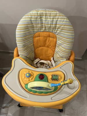 Baby high chair with two trays and detachable toy