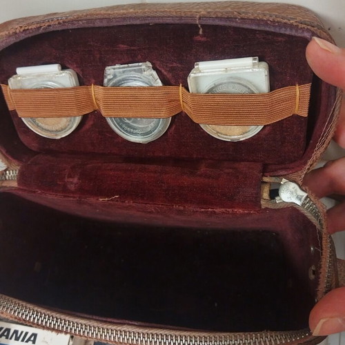 Vintage camera accessories in leather case used