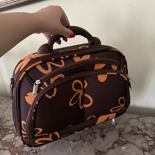 Travel Toiletry Bag like new, brown and orange floral design
