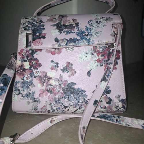 Handbag like new, pink with floral pattern, multiple pockets and strap