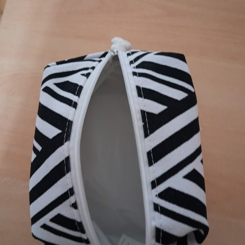 Neutrogena toiletry bag, black and white