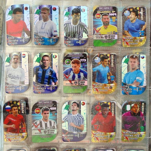 Complete album with European football magnetic metal tags, foil