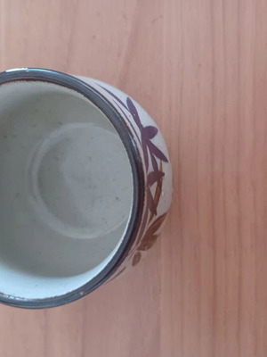 Small ceramic decorative container used