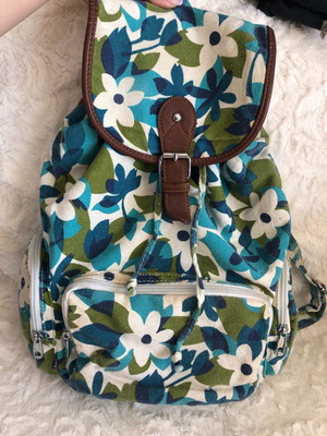 Backpack with wear on outer fabric