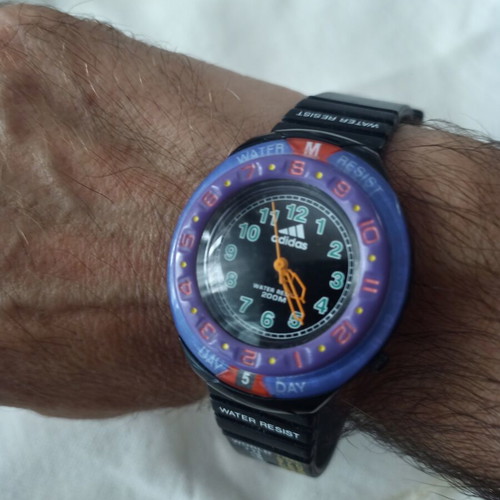 Adidas watch like new with original day and month indicator