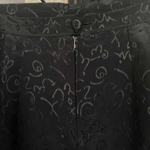 Vintage midi skirt black with floral pattern used, size M