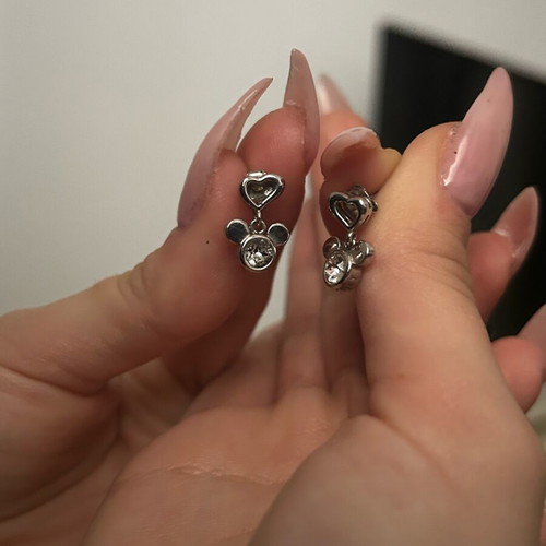 Disney stainless steel earrings like new, gray
