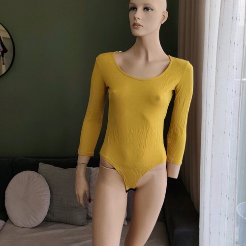 Bodysuit size M/L like new with 3/4 sleeve and snap buttons