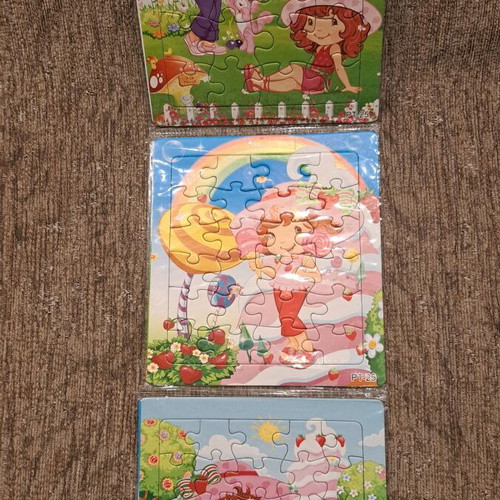 Strawberry Shortcake 3 puzzles new, sealed with hanging hole