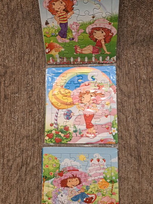 Strawberry Shortcake 3 puzzles new, sealed with hanging hole