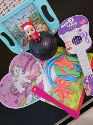 Gift set of 5 items like new with doll, ukulele, fan, puzzle and marble game