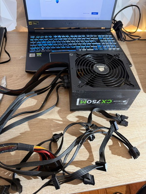 Corsair CX750M power supply, faulty, overheats and shuts down