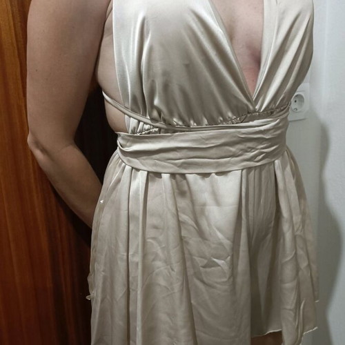 One-piece mini romper like new, gold with crisscross back