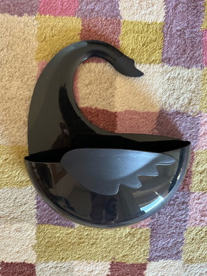 Bathroom accessory in black swan shape
