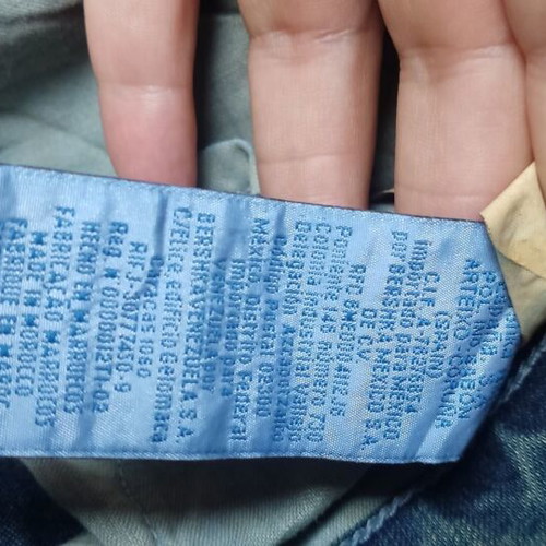 Bershka No 40 Flared Jeans like new, blue with greenish-brown shades