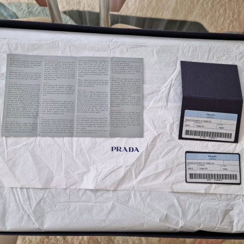 PRADA BOARD MADE OF GENUINE SAFFIANO LEATHER IN BLACK COLOR DATED 1999-2002 APPROX.