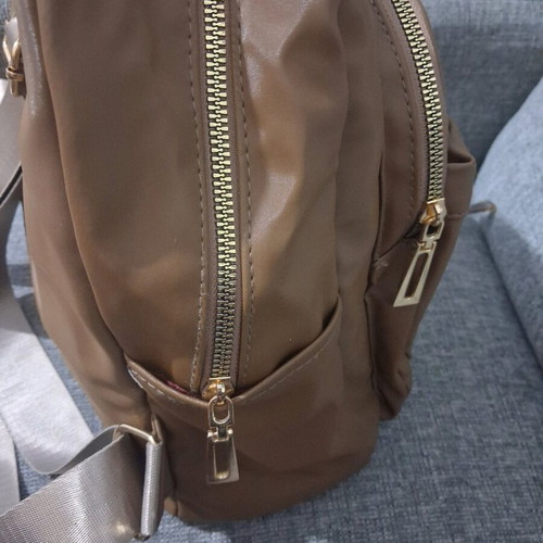 Backpack like new brown with gold zippers