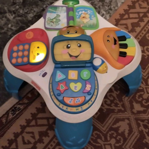 Fischer Price baby toy used, educational table with batteries