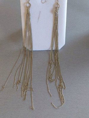 Long dangling earrings like new, gold color