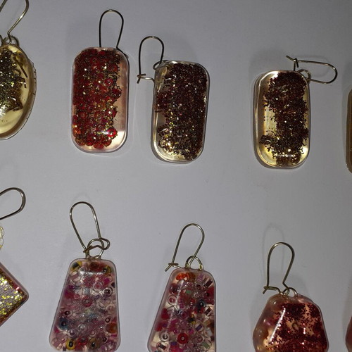 Handmade earrings pack of 38 pairs with liquid glass material