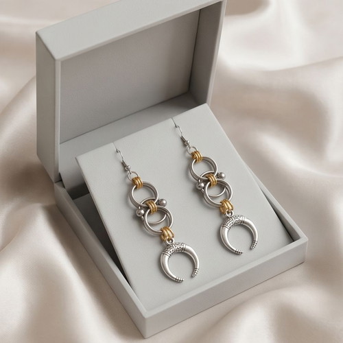Steel earrings with gold-silver bicolor and crescent moon design
