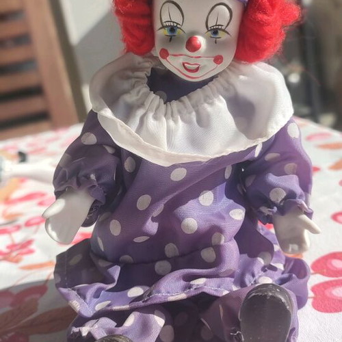 Vintage porcelain clown doll used